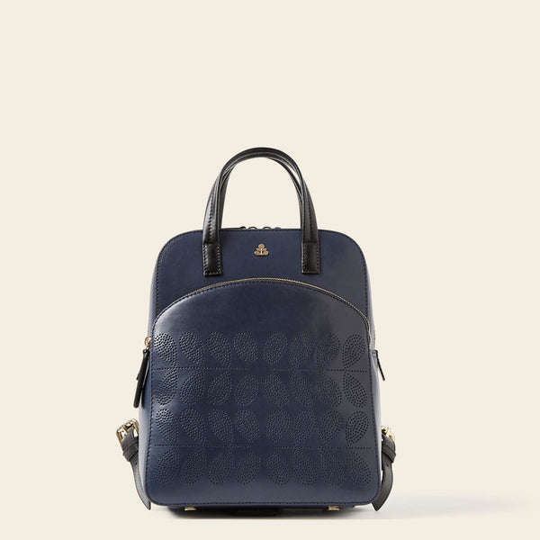 Emilia Backpack in Navy Punched Flower pattern by Orla Kiely