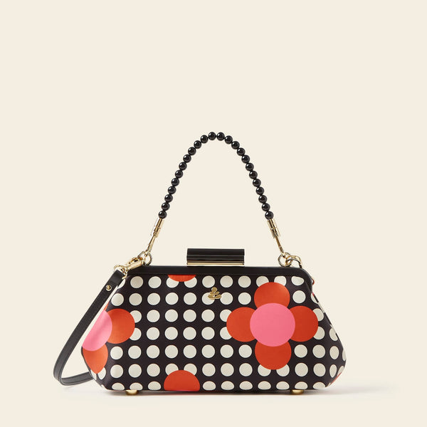 Jenny D Clutch Bag in Fuchsia Flower Polka Dot pattern by Orla Kiely