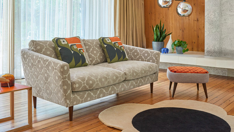 Lifestyle Image of Orla Kiely floral sofa and footstool