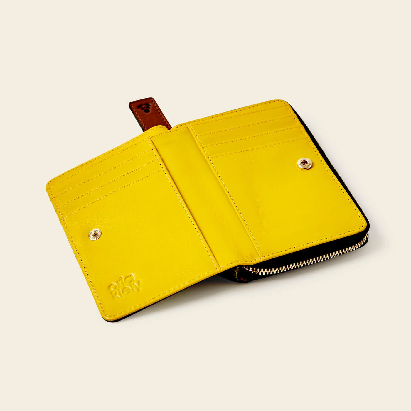 Celia Medium Leather Purse Daffodil Yellow Punched Flower Orla Kiely