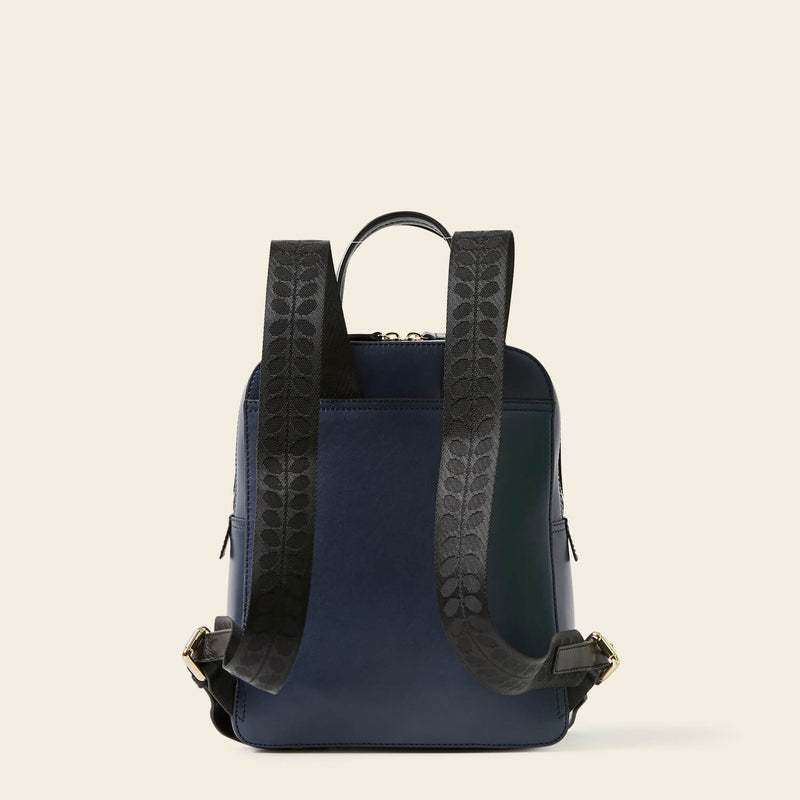 Emilia Backpack in Navy Punched Flower pattern by Orla Kiely