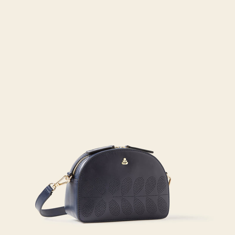 Babaluna Crossbody Bag in Navy Punched Flower pattern by Orla Kiely