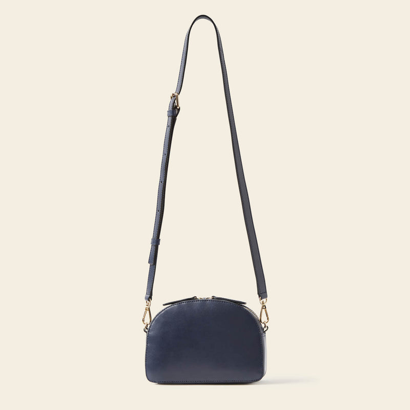 Babaluna Crossbody Bag in Navy Punched Flower pattern by Orla Kiely