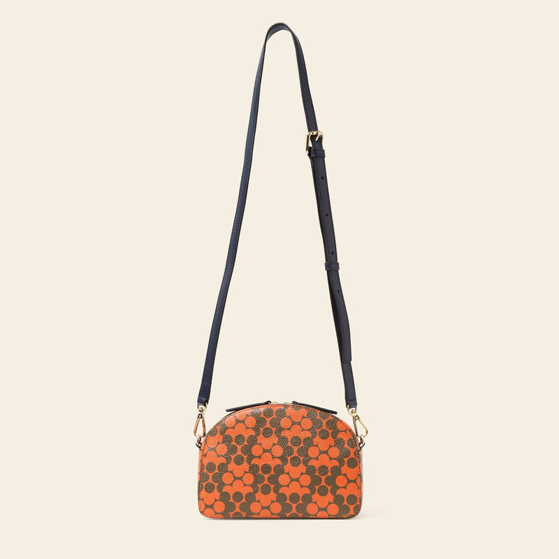 Babaluna Crossbody Bag in Tomato Puzzle Flower pattern by Orla Kiely