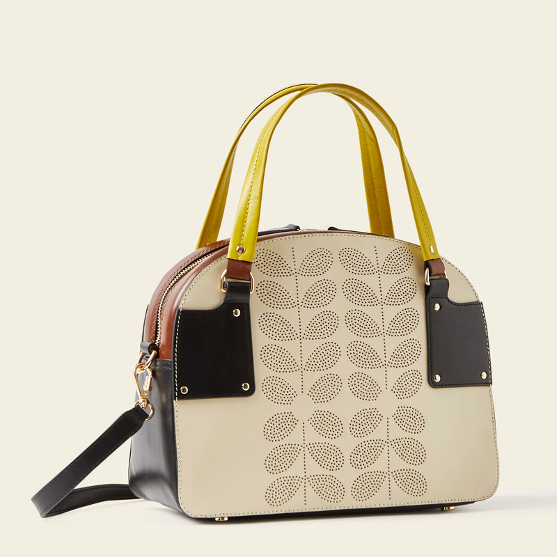 Luna Bowling Bag in Cream Punched Flower by Orla Kiely