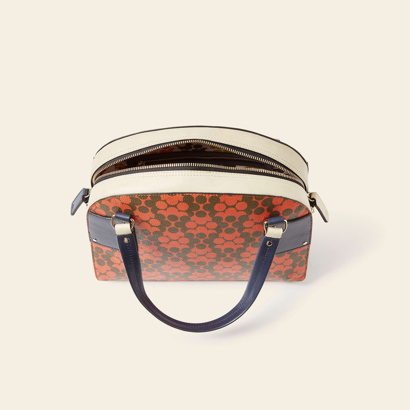 Luna Bowling Bag in Tomato Puzzle Flower pattern by Orla Kiely