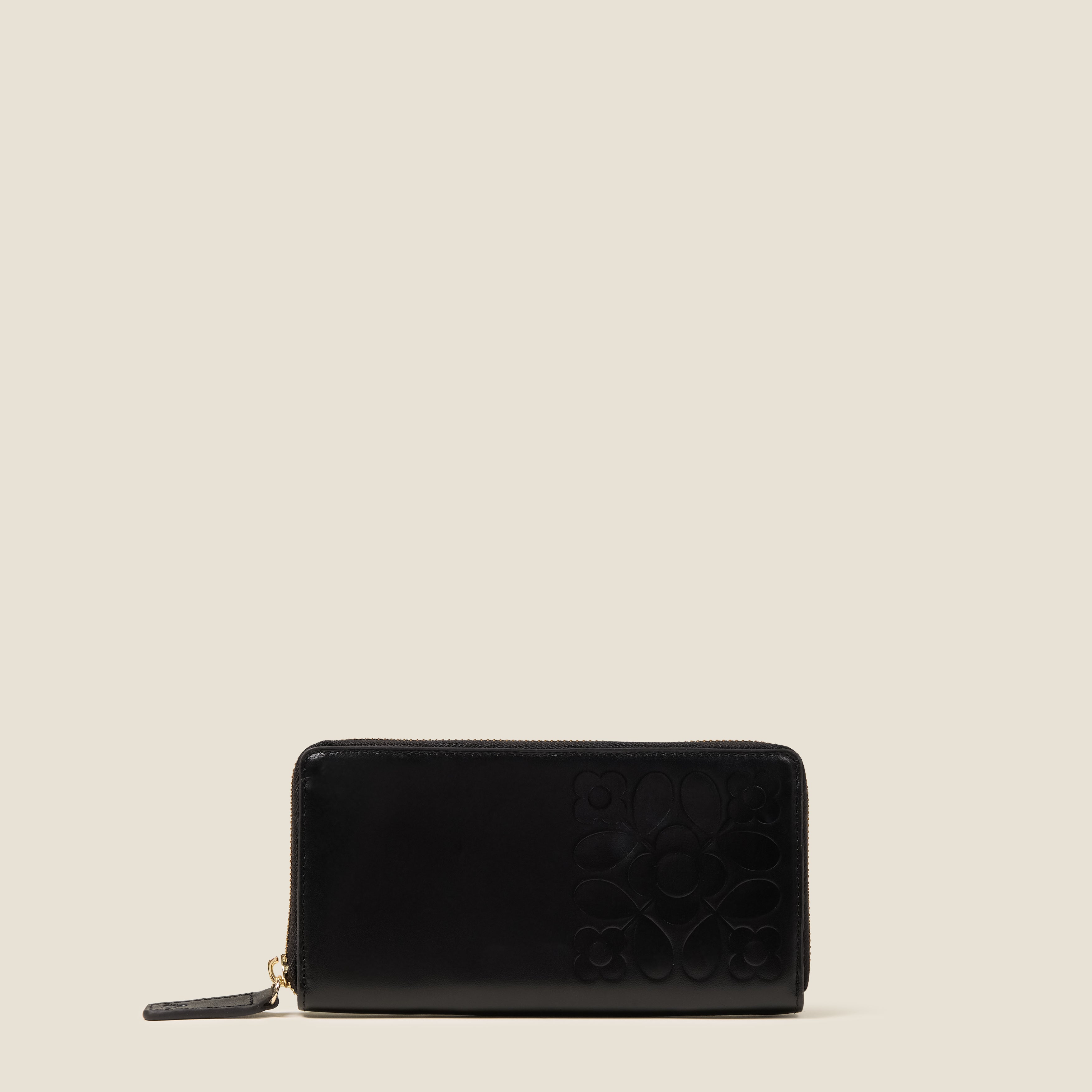 BAck view of the Forget Me Not Wallet in black leather women's wallet with Orla Kiely pattern embossing.