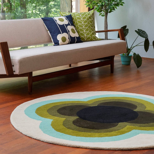 Lifestyle shot of Orla Kiely's sunflower olive rug