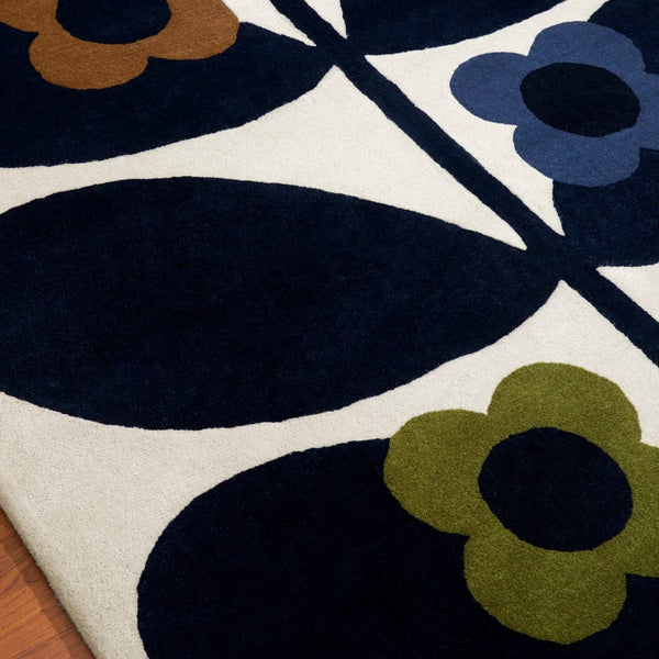 Close up of Wild Rose Fawn Rug by Orla Kiely
