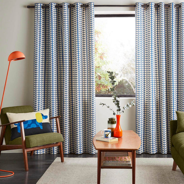 Lifestyle image of Orla Kiely solid stem denim curtains in living room