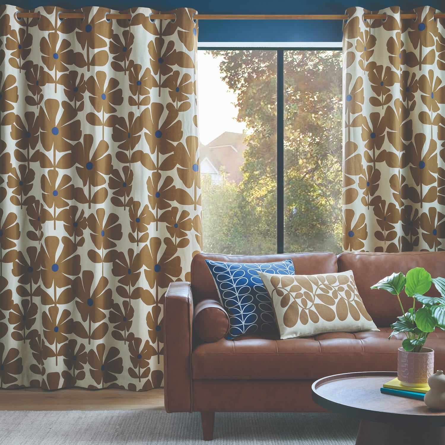 Wildflower Lined Eyelet Curtains Coffee